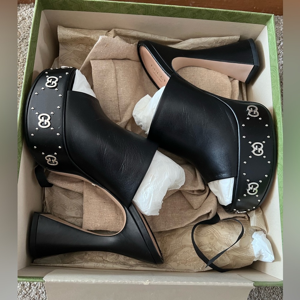 Gucci black platform mules with silver logos